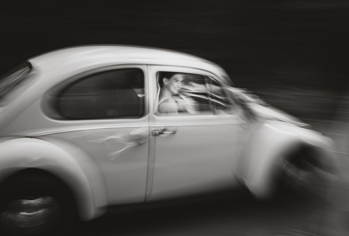 bride in vintage car photographed by Majorca photographer - Romany Flower