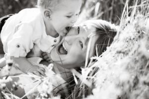 mallorca lifestyle photographer - mother and child enjoying nature in b&w
