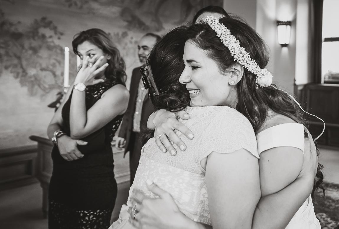 emotional momet with a bride after ceremony - by wedding phographer romany flower in mallorca