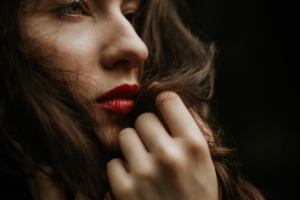 moody portrait photography mallorca - fierce woman in a red lipstick