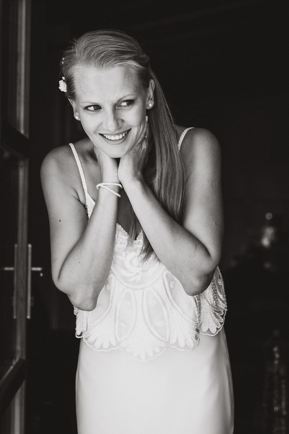 summer wedding in Mallorca - black and white portrait of the bride feeling excited