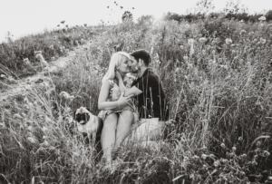 couple photographer in chile: loving couple in grass landscape