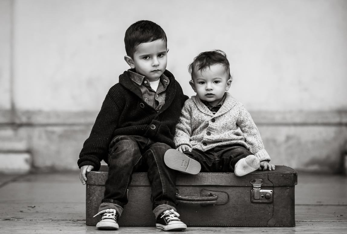 kids portrait by Photographer in Chile: siblings portrait in b&w