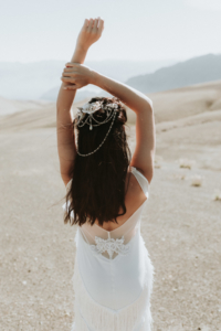 bride in stunning mountain scenery during her adventure wedding in south america
